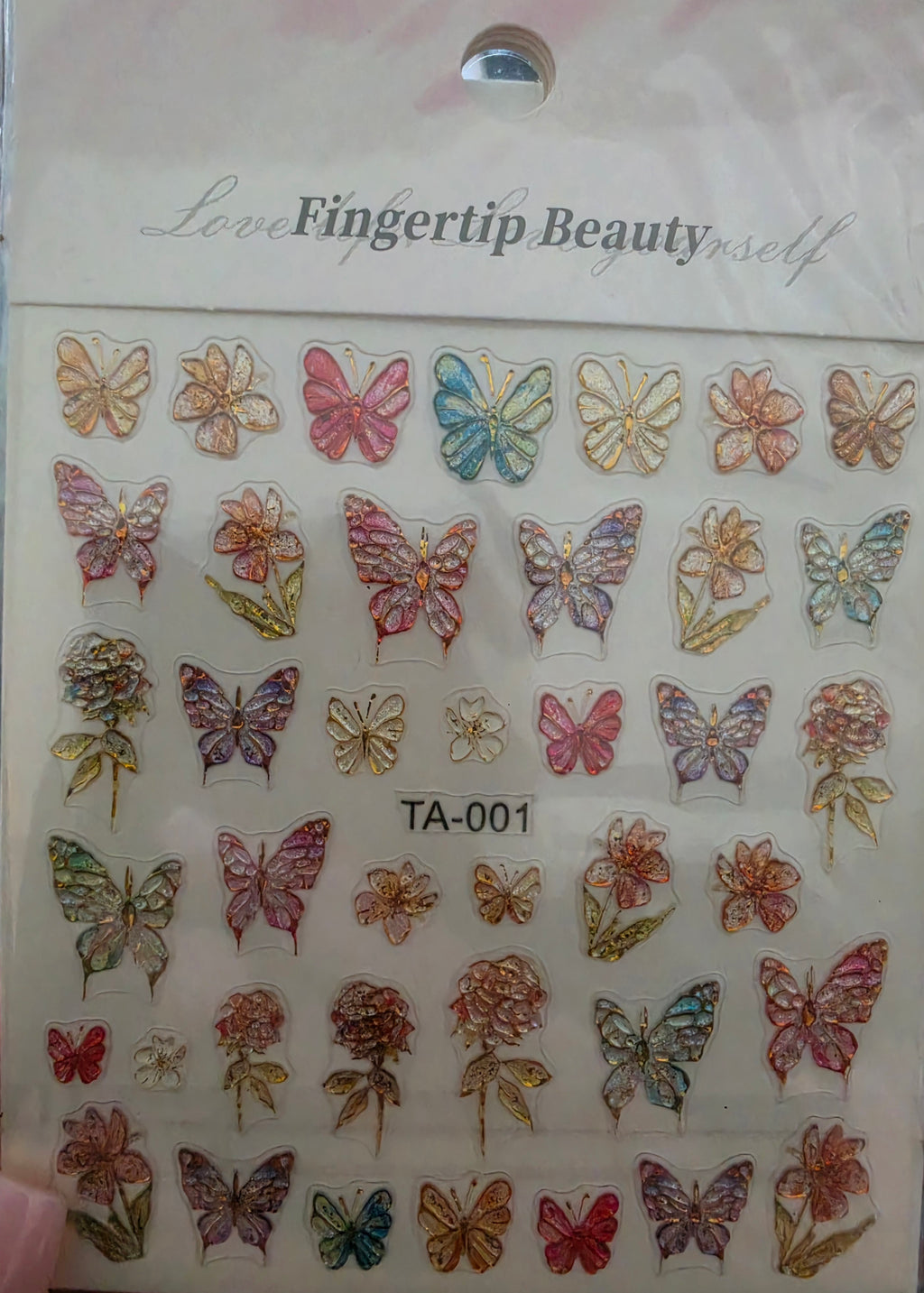 3 sets of nail decals plus press on nails