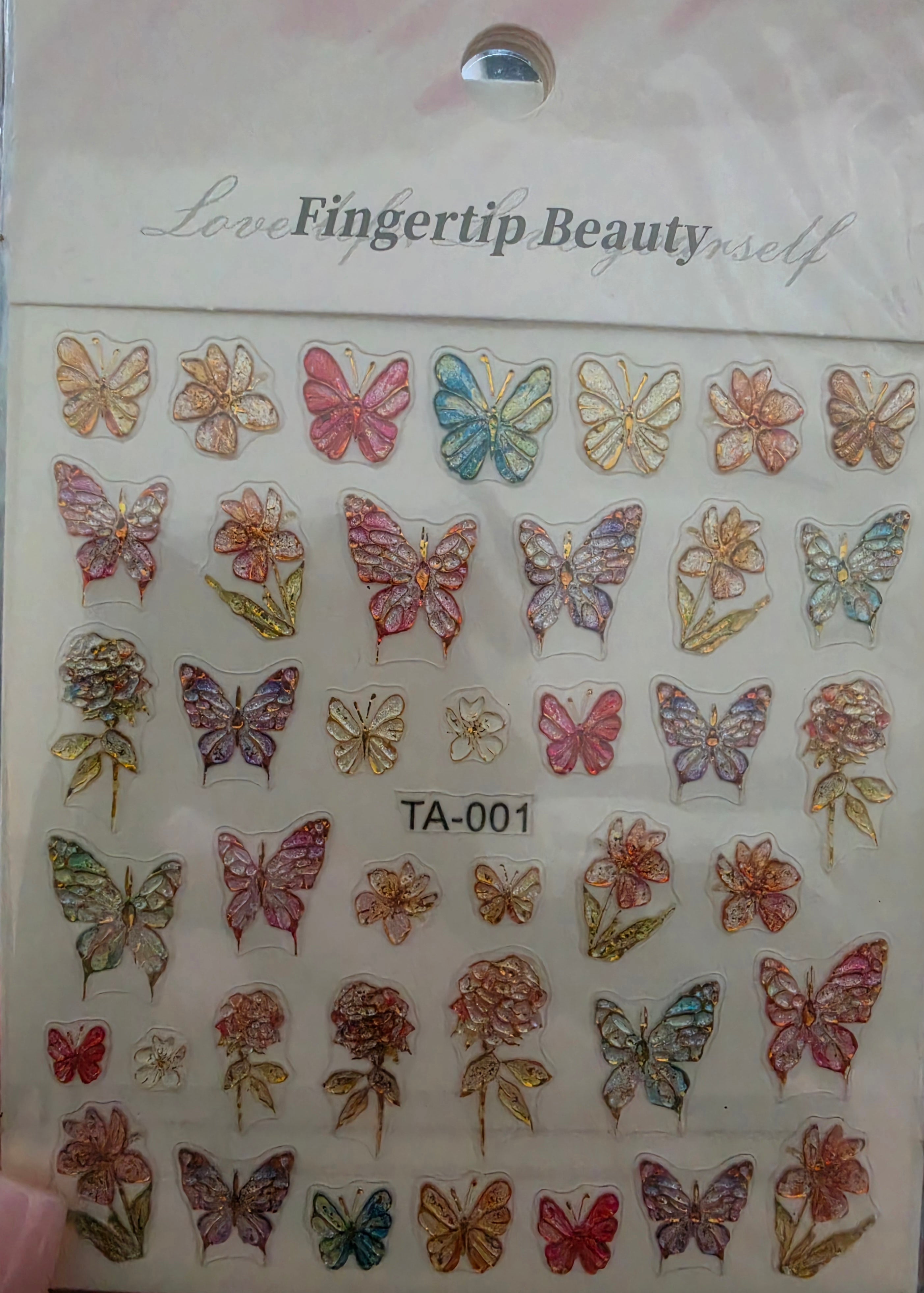 3 sets of nail decals plus press on nails