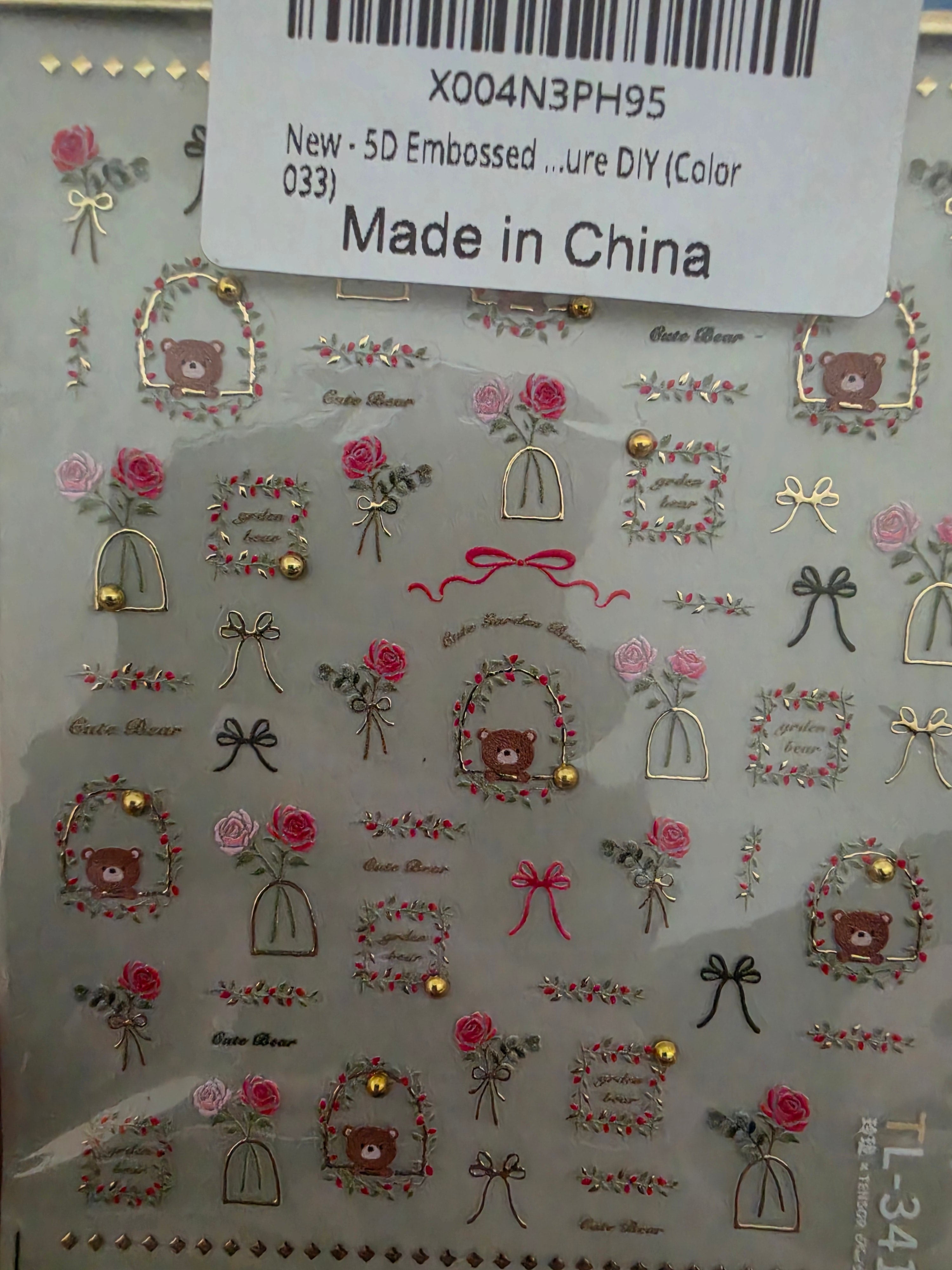 3 sets of nail decals plus press on nails